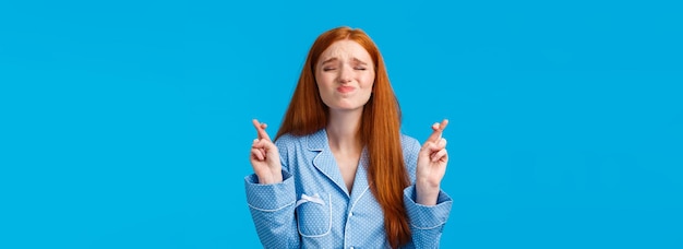 Girl eager to win competition making wish night before exam pleading redhead teenage female student 