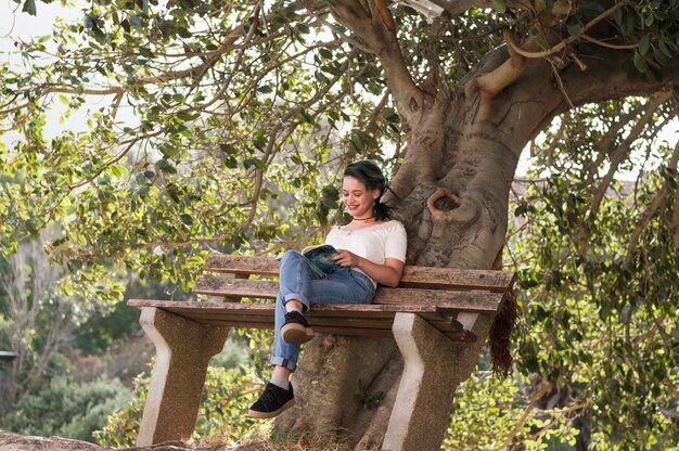 Girl on elevated bench