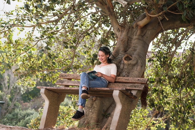 Girl on elevated bench