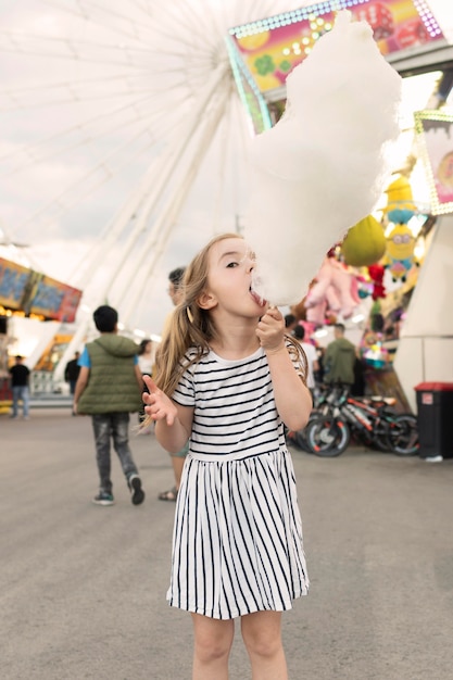 Girl enjoying cotton candy