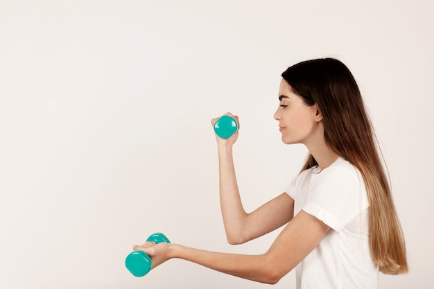 Girl exercising muscles