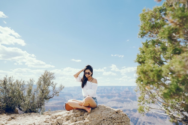 Free photo girl exploring the grand canyon in arizona