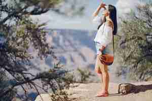 Free photo girl exploring the grand canyon in arizona