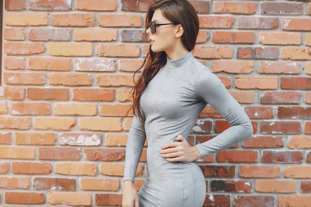 girl fashion brick wall
