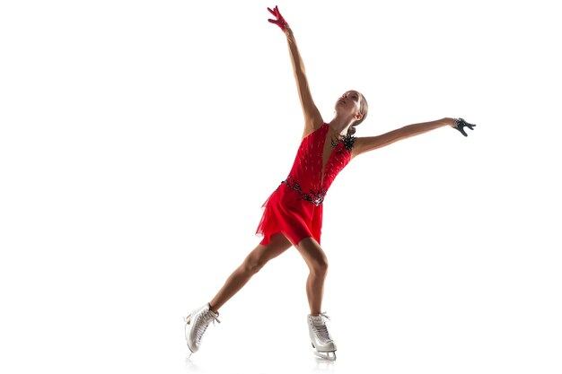 Girl figure skating isolated. Professional practicing and training in action and motion on ice. Graceful and weightless. Concept of movement, sport, beauty.