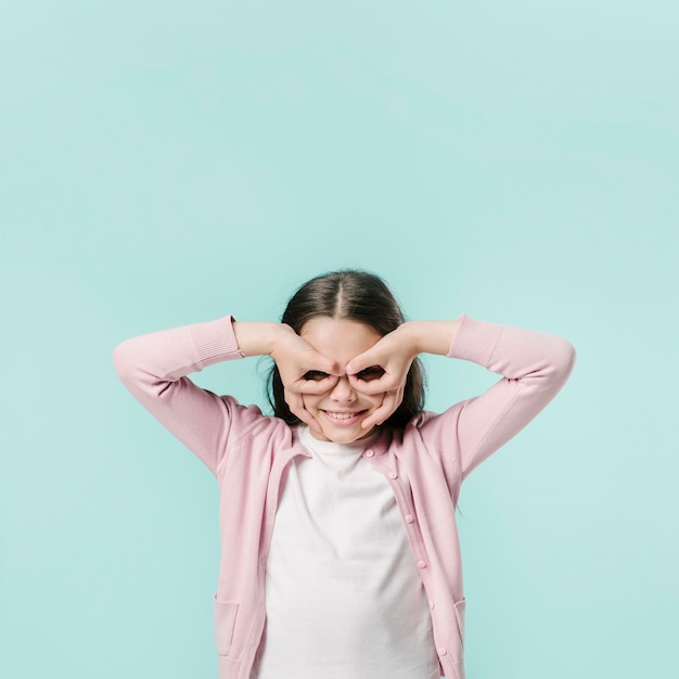 Free photo girl fooling around in studio