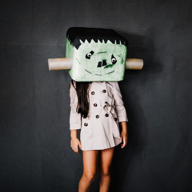 Free photo girl in frankenstein mask