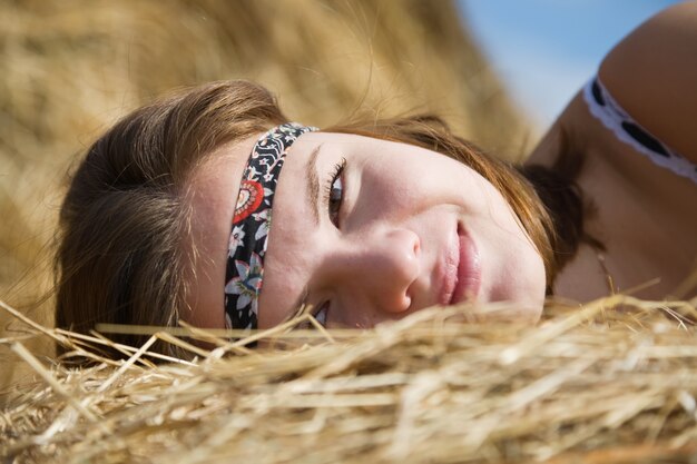 girl on fresh hay