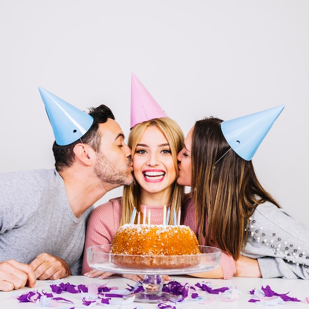 Free photo girl getting kissed on birthday