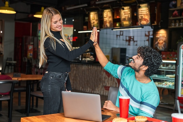 Girl gives five to a guy from India.