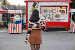 Free photo girl going to a food truck