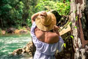 Free photo girl in hat at the river