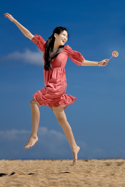 Girl having fun on the beach