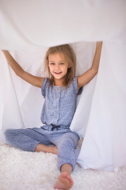 Girl having fun in her shelter