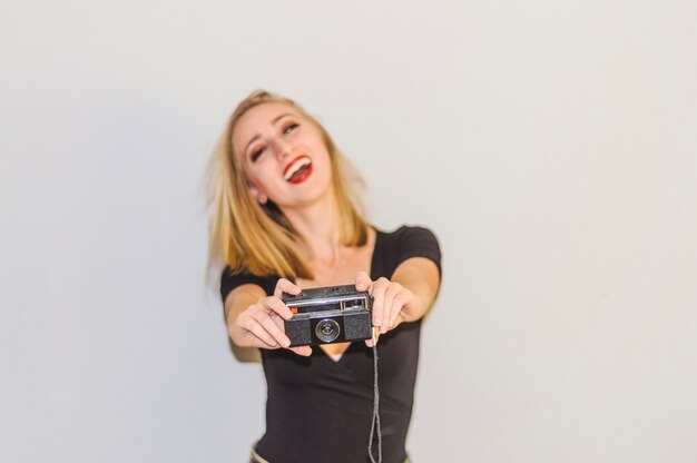 Girl having fun with camera