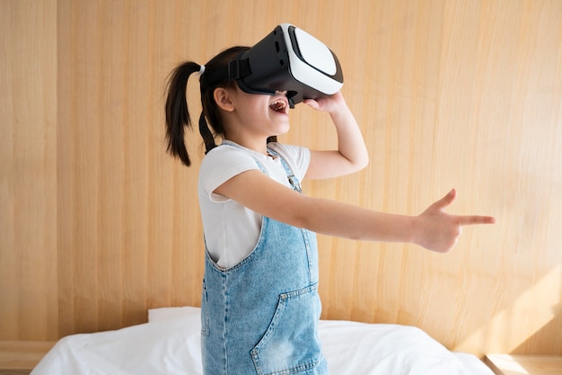 Free photo girl having fun with vr glasses