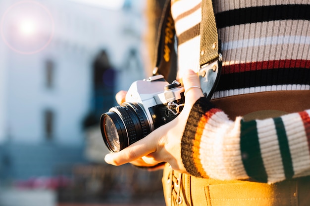 Free photo girl holding camera