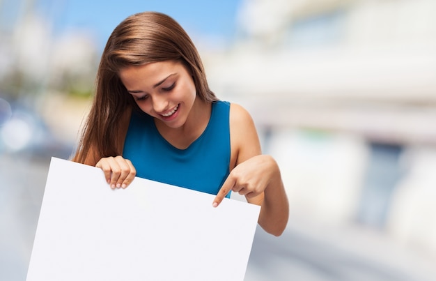 Girl holding a sign