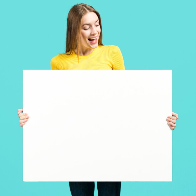 Girl holding sign