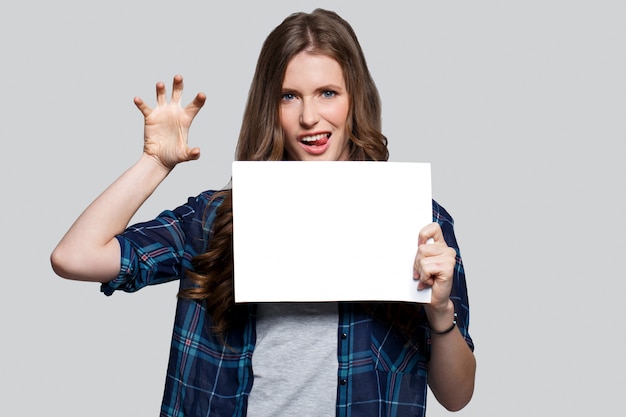 Girl holding white billboard