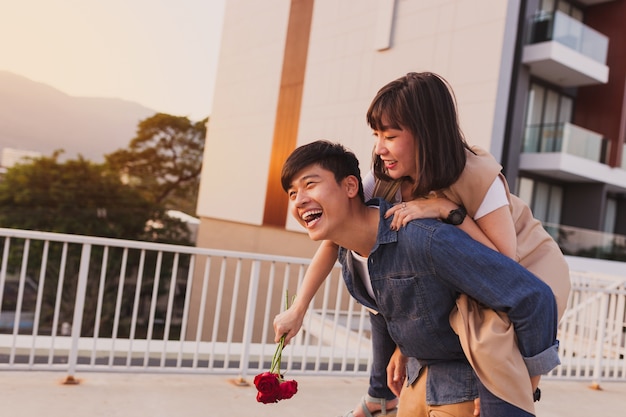 Girl on horseback on top of her boyfriend