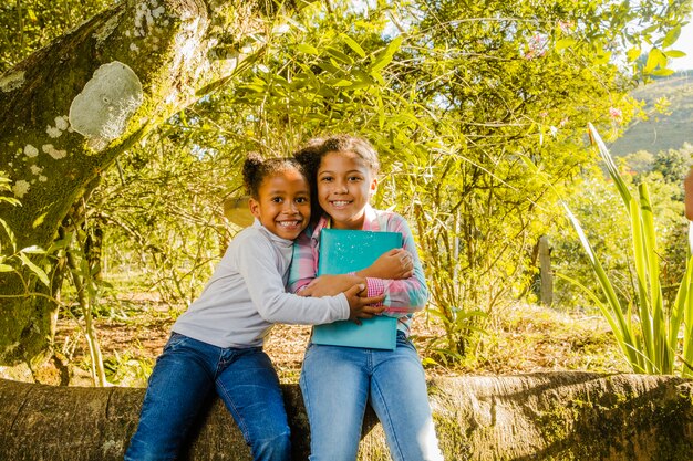 Girl hugging her sister