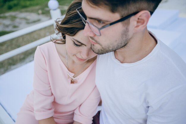 Girl leaning on her boyfriend's shoulder