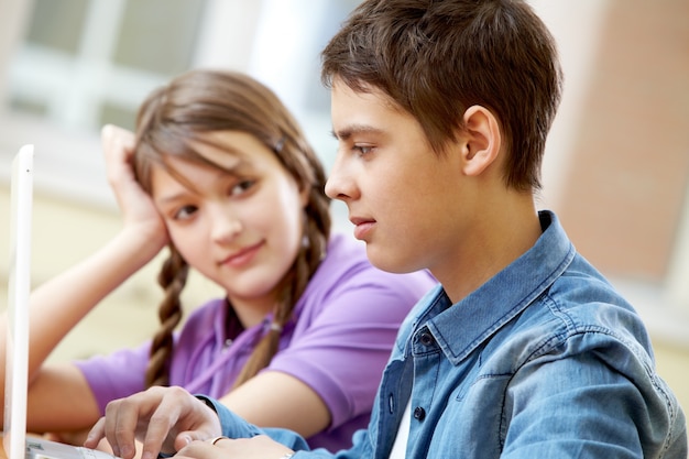 Girl looking at her classmate