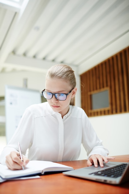 Girl making notes