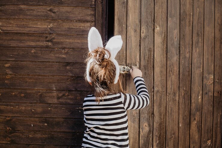 Free Photo girl opening shed door