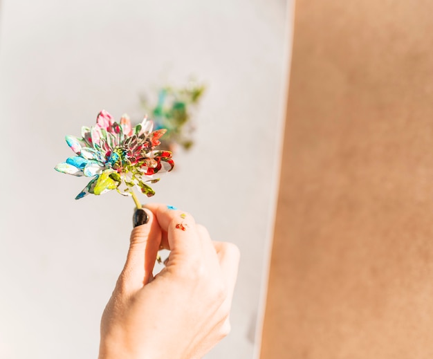 Girl painting with flower