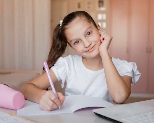 Girl paying attention on online lessons