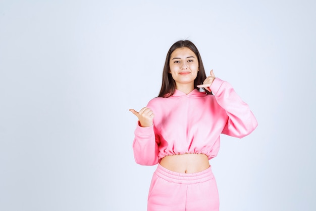 Girl in pink pajamas asking to call