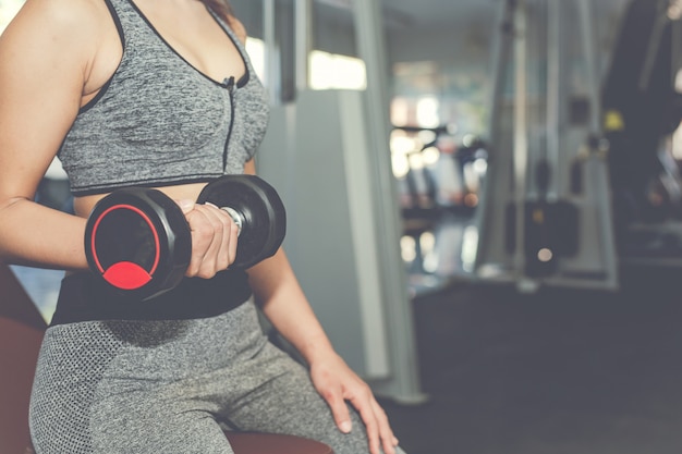 Girl playing fitness in the gym