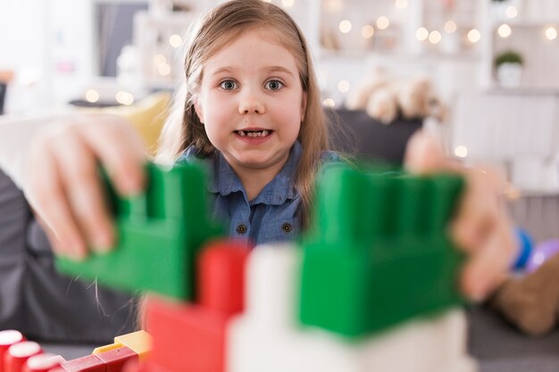 Girl playing in living room