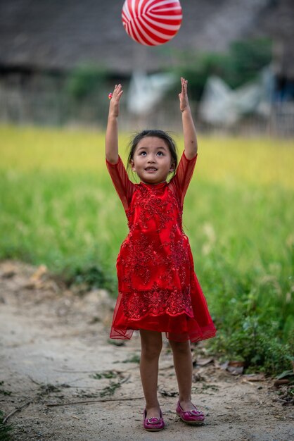 Girl playing with a ball