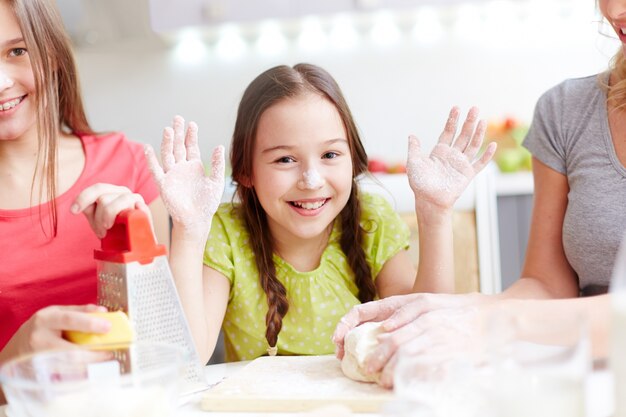 Girl playing with flour