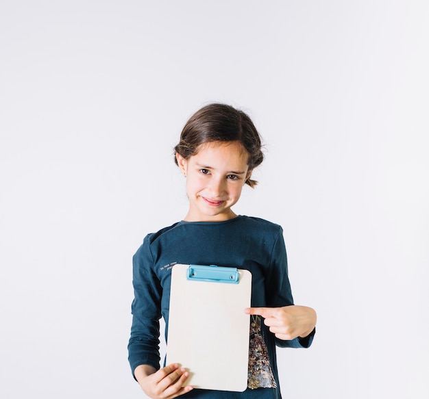 Girl pointing at clipboard