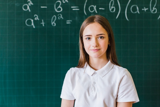 Girl posing with calculations