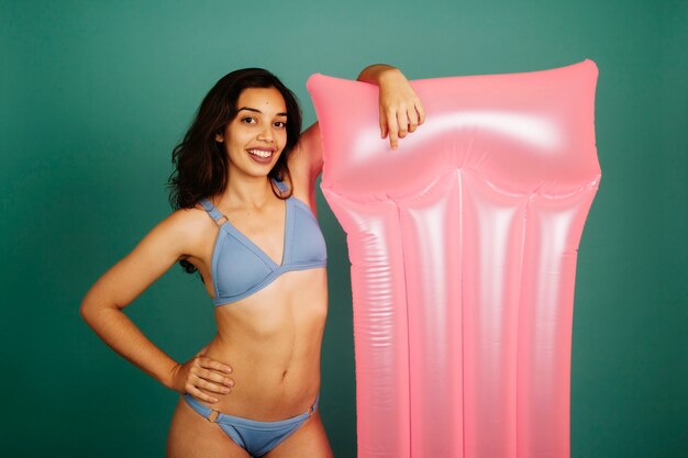 Girl posing with pool mattrass