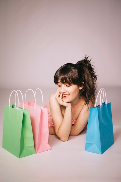 Girl posing with shopping bags
