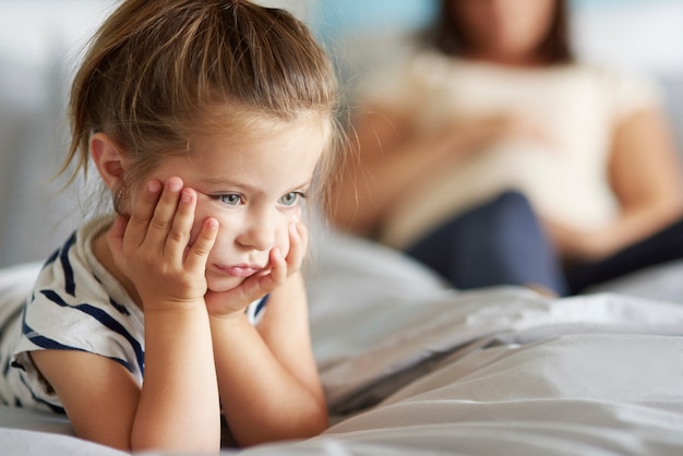 Free photo girl not satisfied with her new sibling