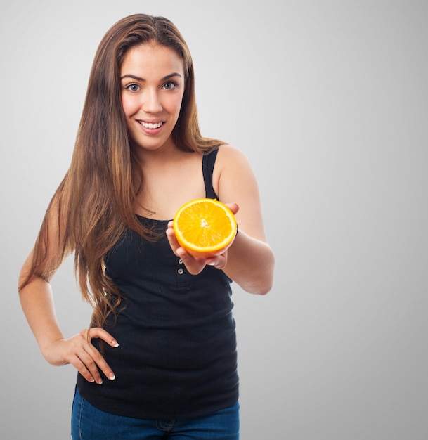 Girl sharing orange