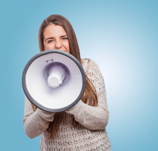 Girl shouting at the megaphone