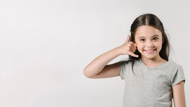 Girl showing call sign in studio