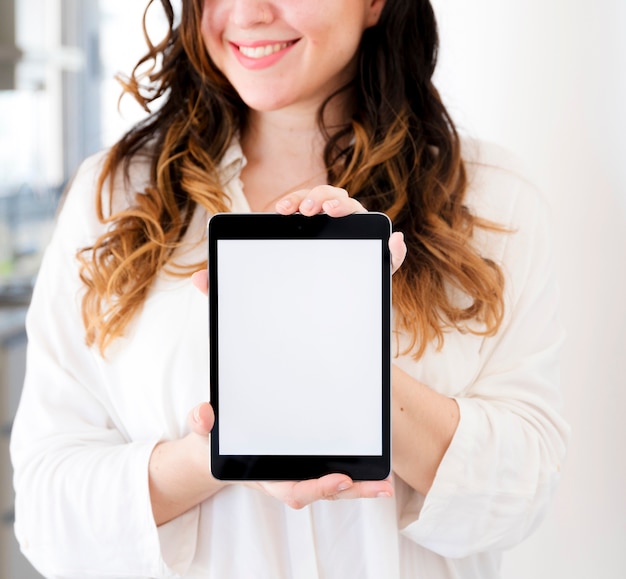 Girl showing tablet