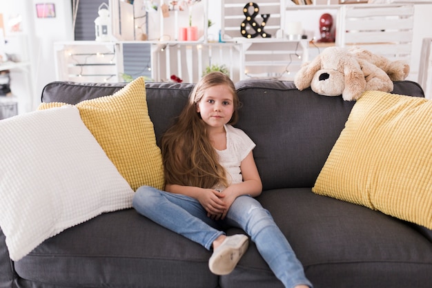 Girl sitting on couch