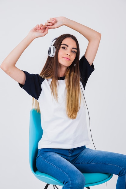 Girl sitting and dancing