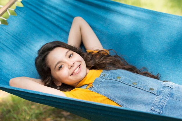 Girl sitting in hammock