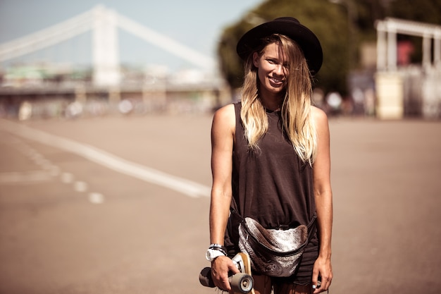 the girl skates on skateboard